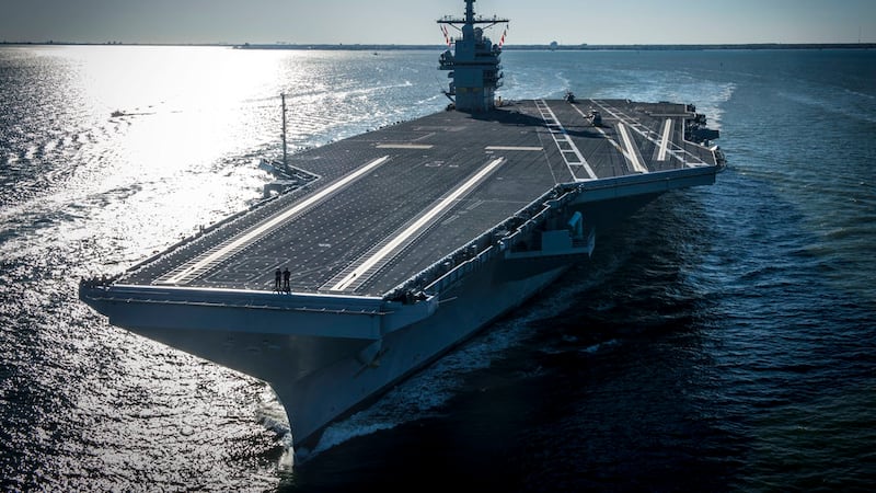 In this photo provided by the U.S. Navy, the USS Gerald R. Ford embarked on the first of its...