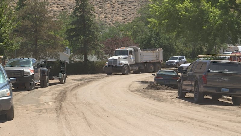 Crews clean up on Pembroke Dr. on Monday, June 22