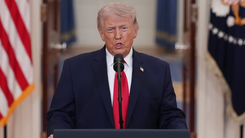 President Donald Trump speaks about the Iran war from the Cross Hall of the White House on...