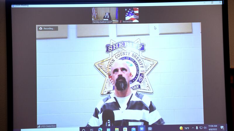 Defendant Troy Driver appeared by video from the Lyon County jail during his arraignment,...