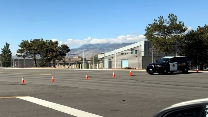The scene of a fatal hit-and-run crash involving a bicyclist on South Rock Boulevard next to...