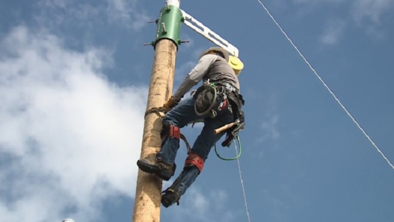 Pre-apprentice groundman trains to repair power lines by climbing pole at the NV Energy Reno...