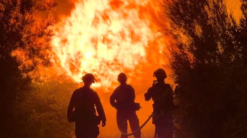 Firefighters battling the Gold Ranch Fire