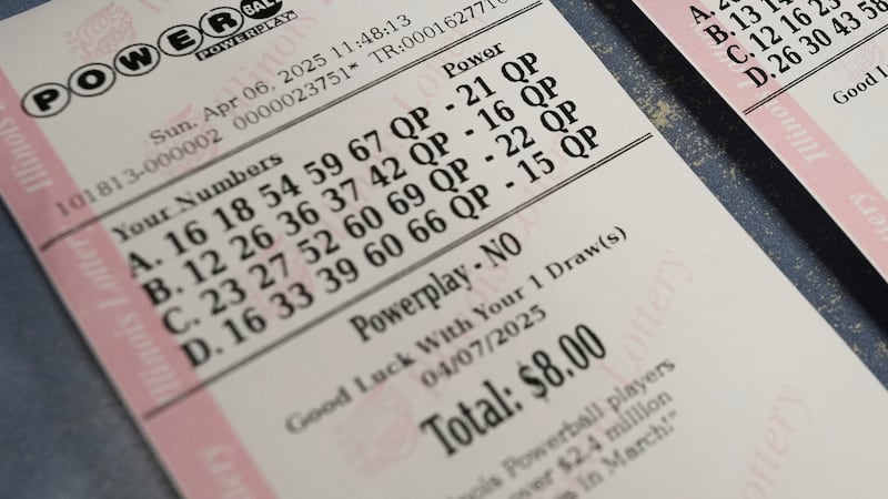Purchased Powerball and Mega Millions tickets are shown at Mares Mart in Chicago, Sunday,...