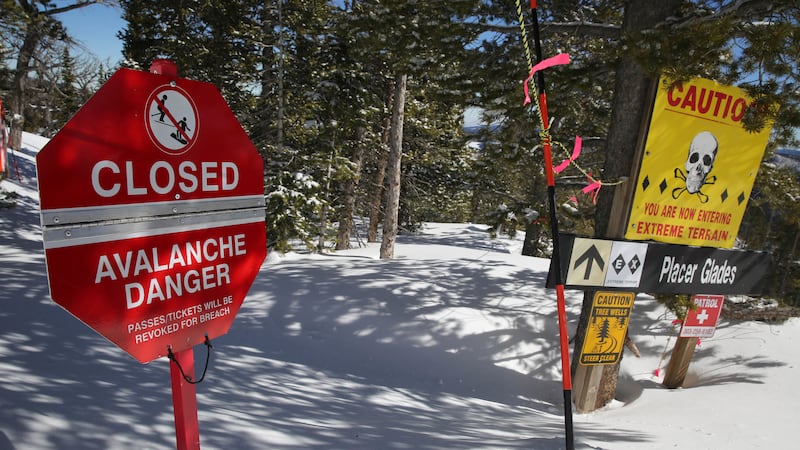 FILE- In this Feb. 26, 2014, file photo, a sign alerts skiers to danger on Corona Bowl, known...